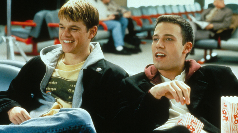 Loki and Bartleby laughing eating popcorn in 