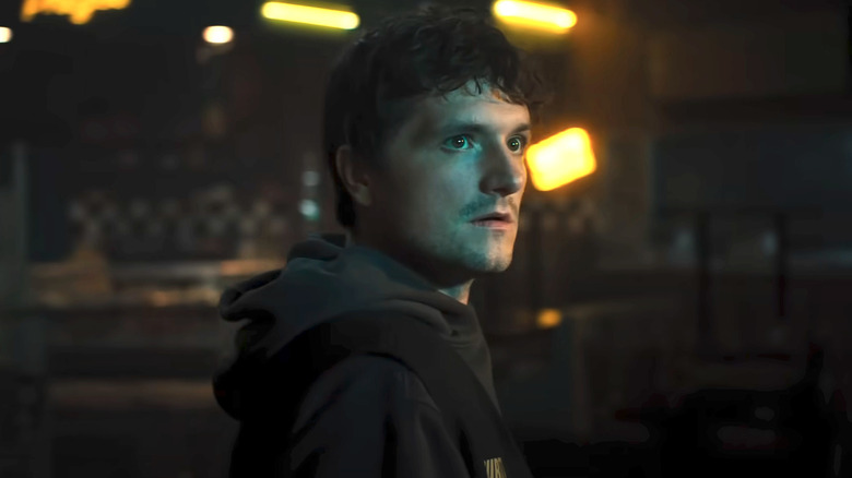 Josh Hutcherson looks over his shoulder
