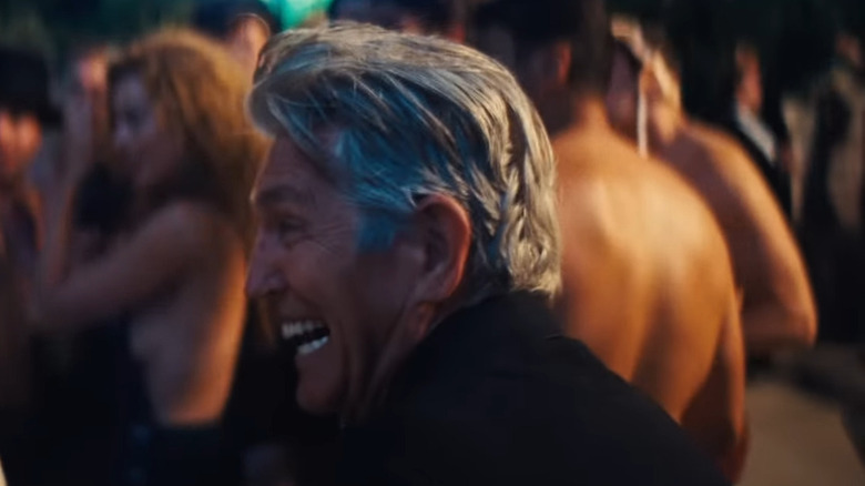 Eric Roberts laughing