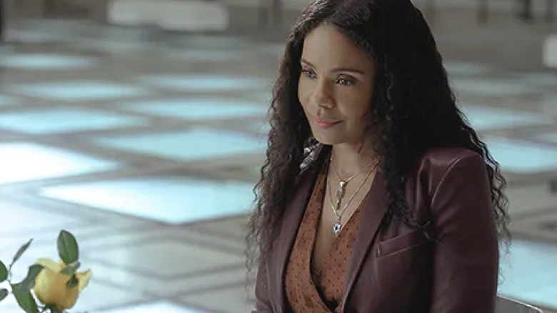 Sanaa Lathan listening intently