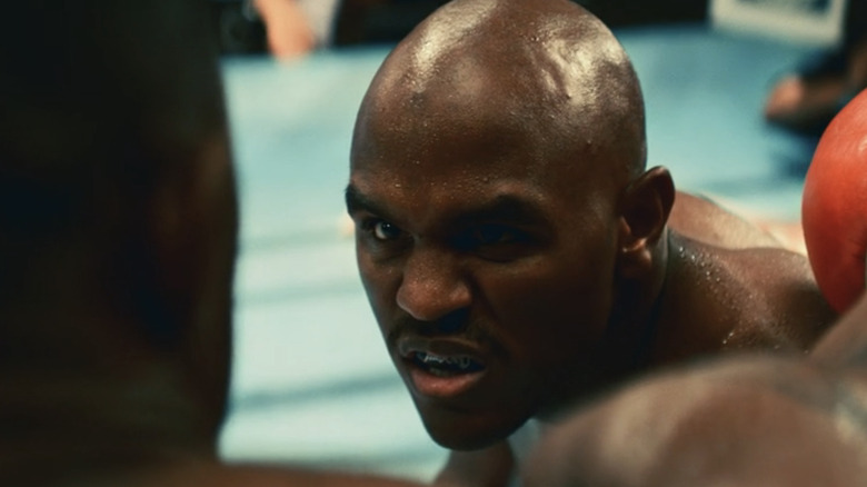 Johnny Alexander dodges punch in Mike