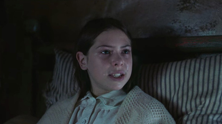 Anna sitting in bed