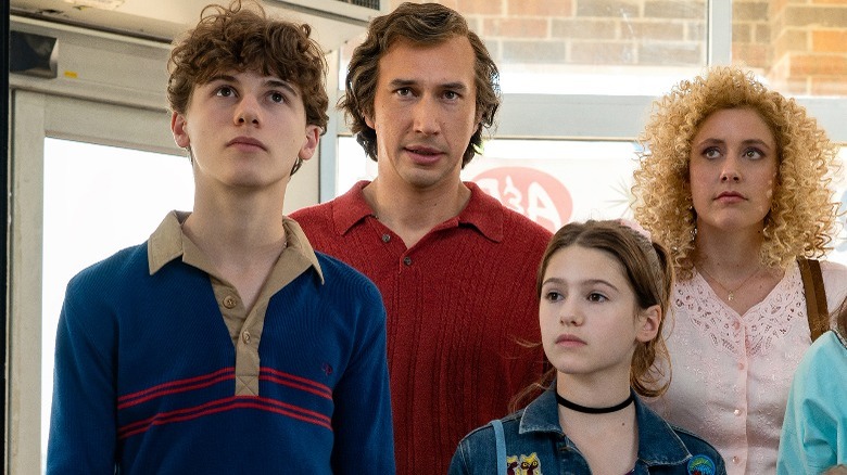 The Gladneys standing in market