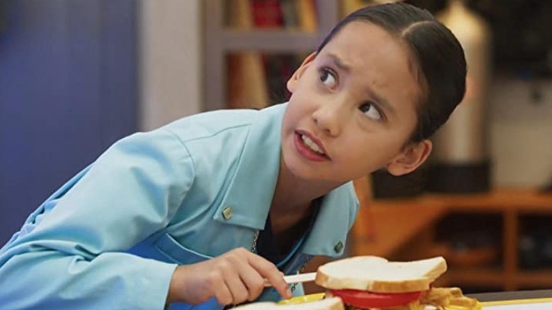 Ava Cheung eating a sandwich