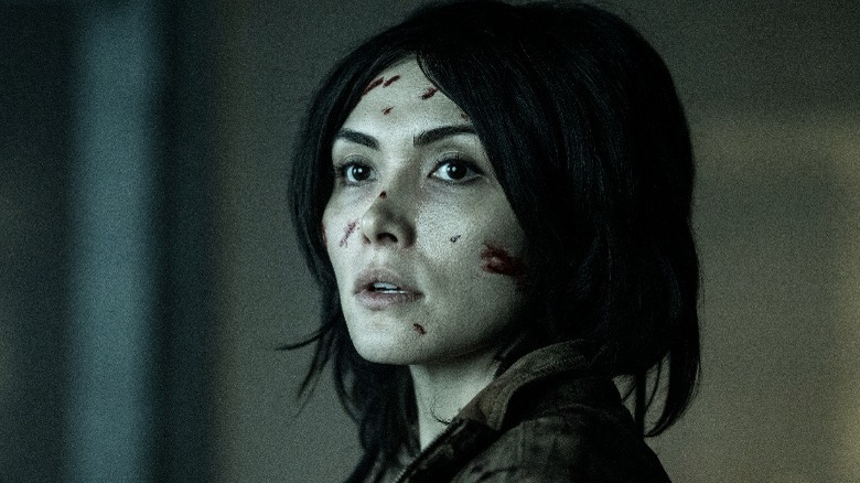 Idalia with bloodied face