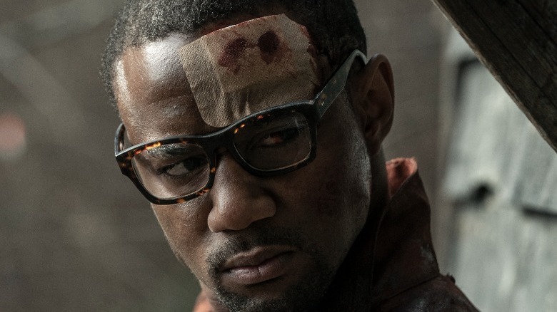 Davon wearing bandage on forehead