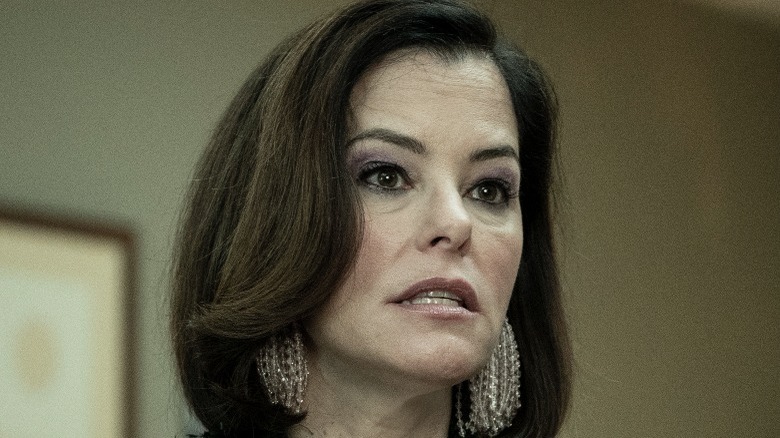 Parker Posey as Blair grimacing