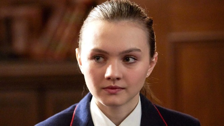 Elaine wearing school uniform