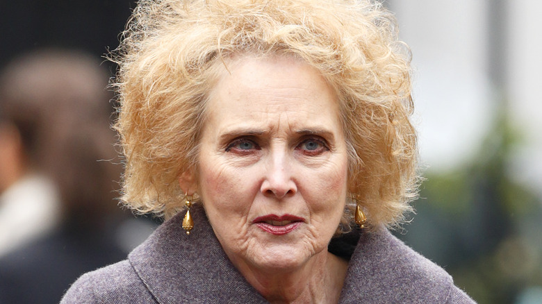 Elizabeth Counsell walking down the street  