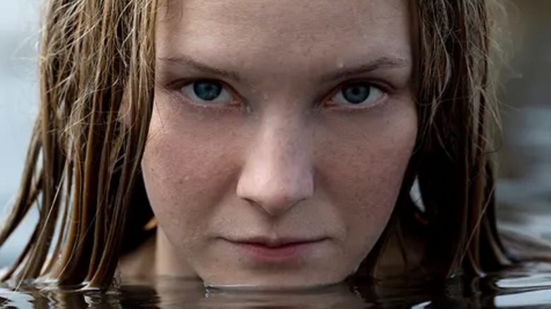 Galadriel swimming in water