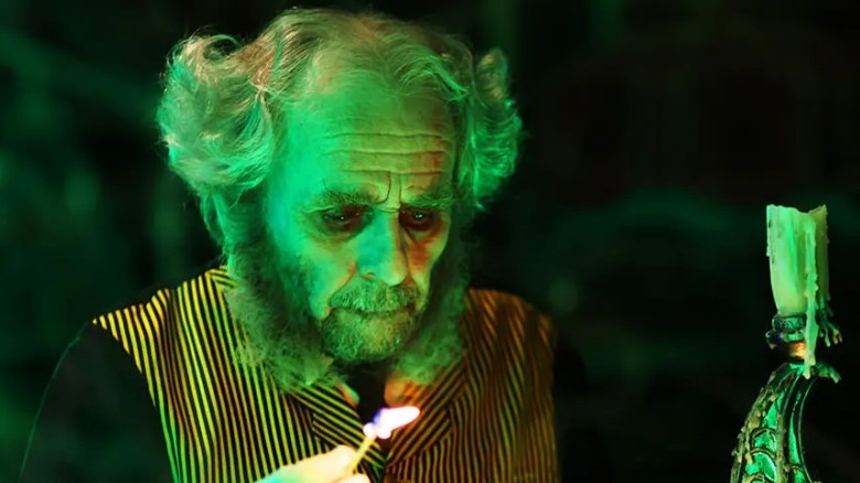 Igor holding a match
