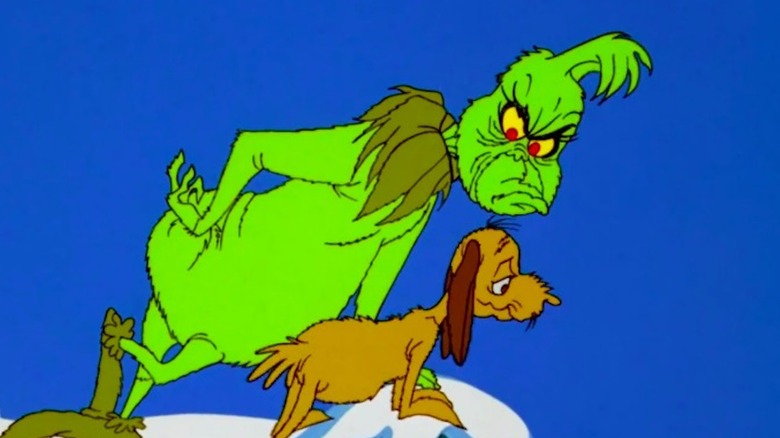 Grinch scowling at his dog