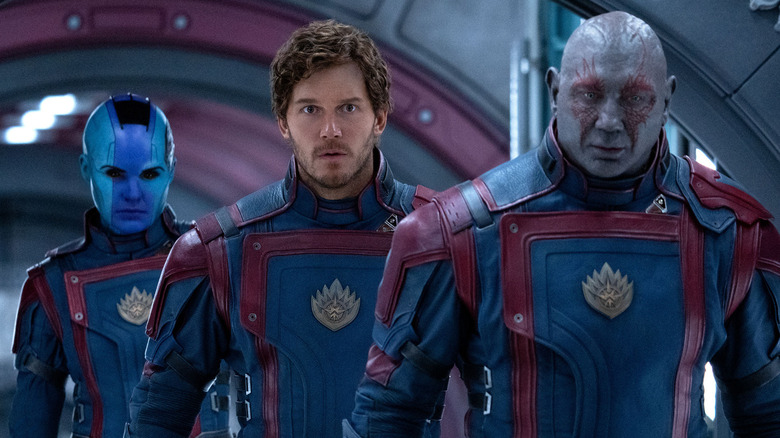 Nebula, Peter Quill, and Drax walking together