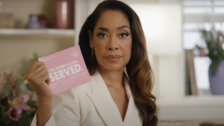 Gina Torres holding jury summons