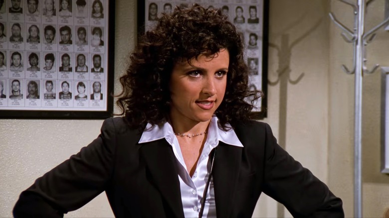 Elaine Benes looking mad elbows out