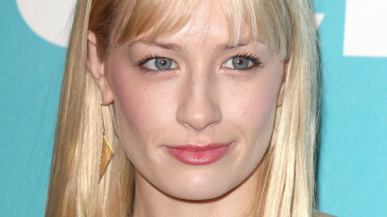 Beth Behrs smiling slightly