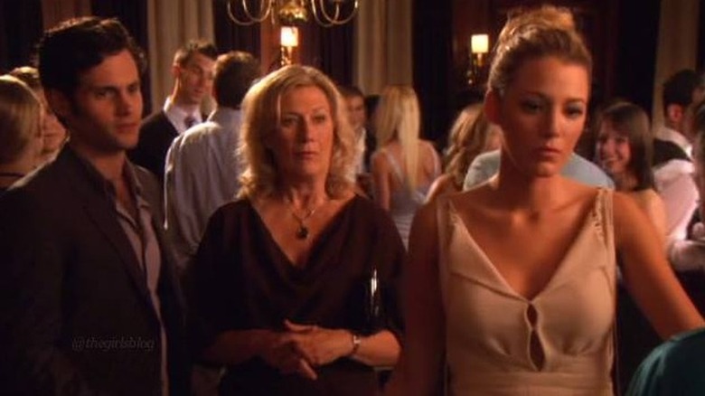 Dan, Dean Reuther, and Serena standing