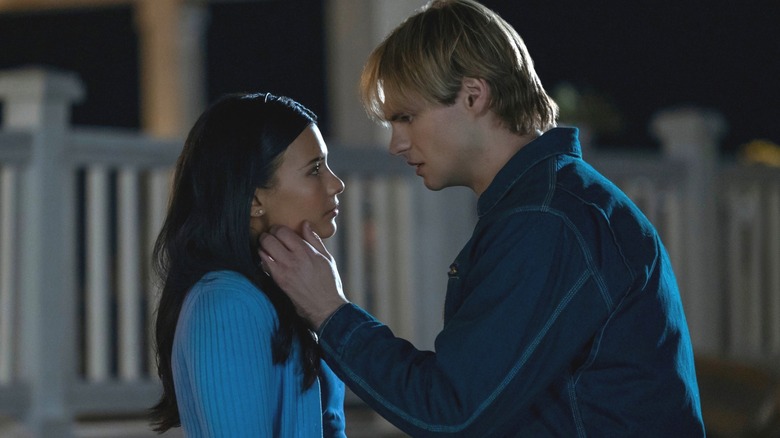 Jackie and Cole embracing in 