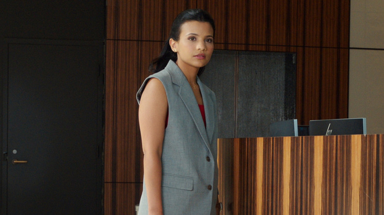 Jackie standing in a lobby in 