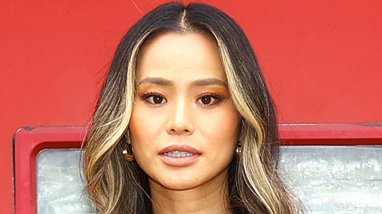 Jamie Chung posing for photo