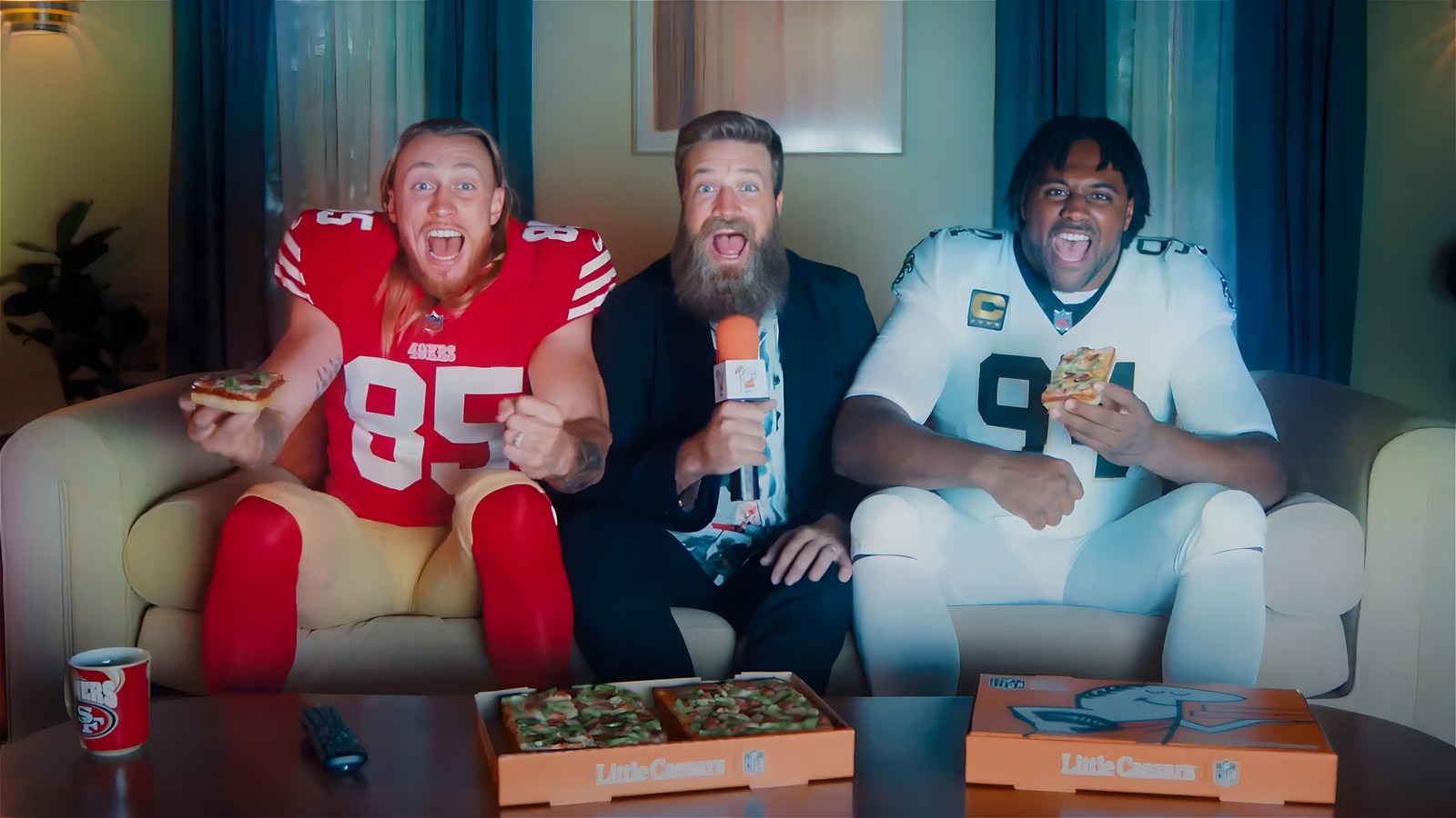 Who Eats Pizza With Kittle In That Little Caesars Commercial?