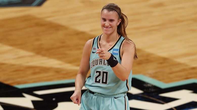 Ionescu pointing on the court