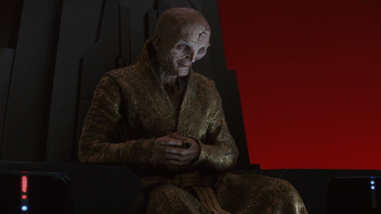 Snoke sitting crossing arms