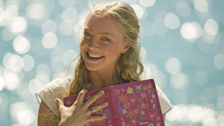 Sophie hugs her diary in "Mamma Mia!" (2008)
