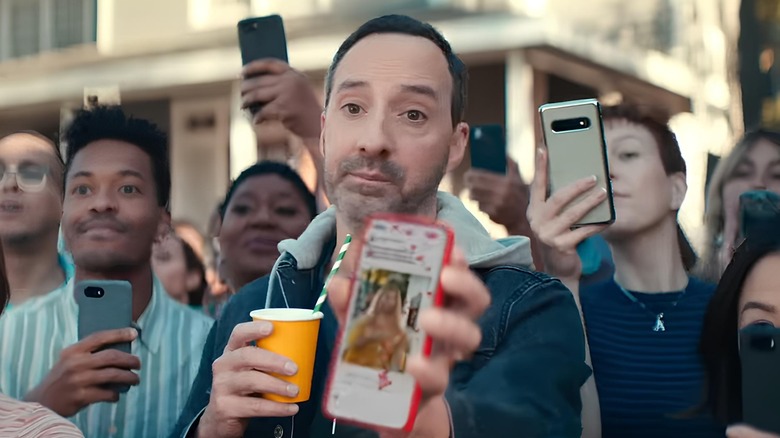 Tony Hale holding phone