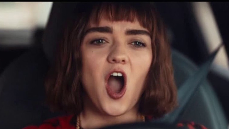 Maisie Williams driving an Audi