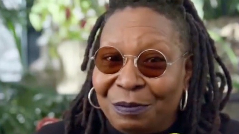 Whoopi Goldberg smiling in ad