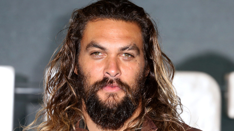 Jason Momoa sporting brown jacket