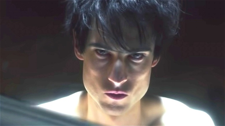 Tom Sturridge frowning in "The Sandman"