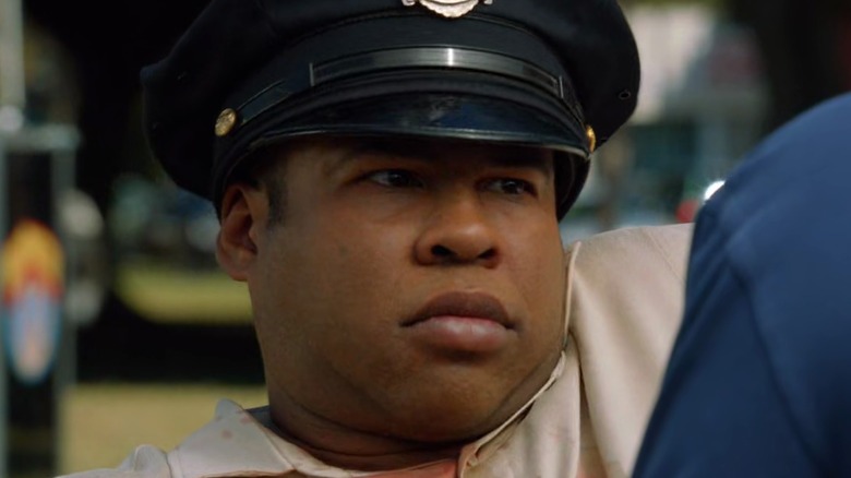 Derrick wearing a mock police hat
