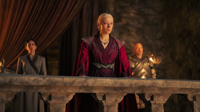 Rhaenyra standing on a balcony in House of the Dragon