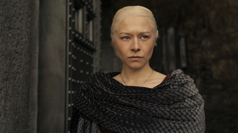 Rhaenyra glaring in a black cloak on House of the Dragon