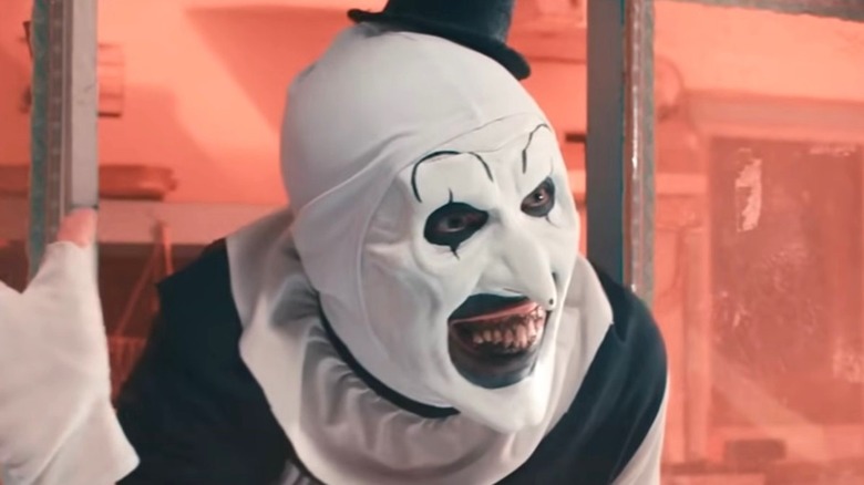 Art the Clown smiling with hands open