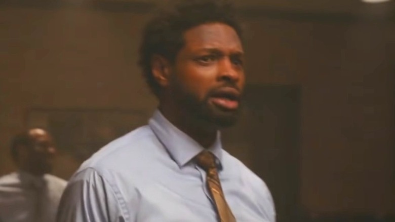 Zoots wearing collared shirt and tie