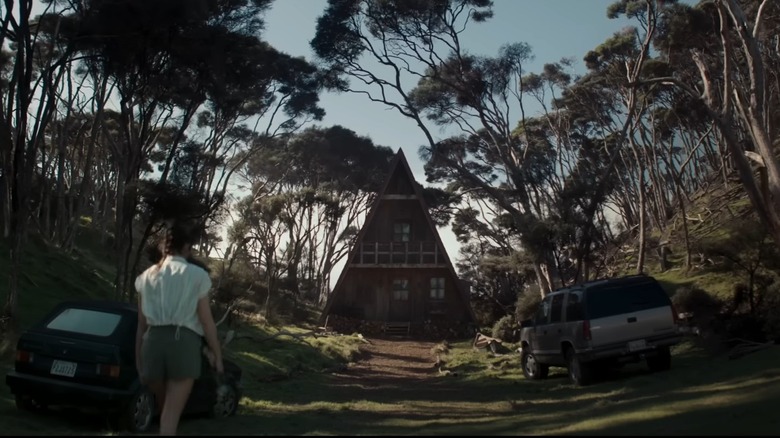 Teresa walking towards cabin