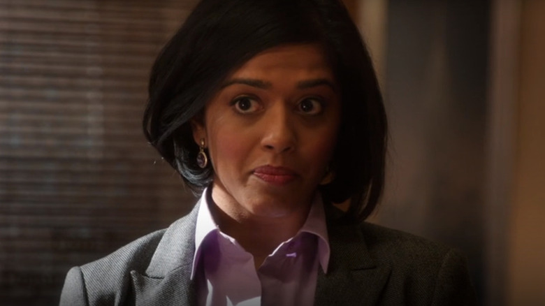 Pallavi Sastri wearing a suit in an office