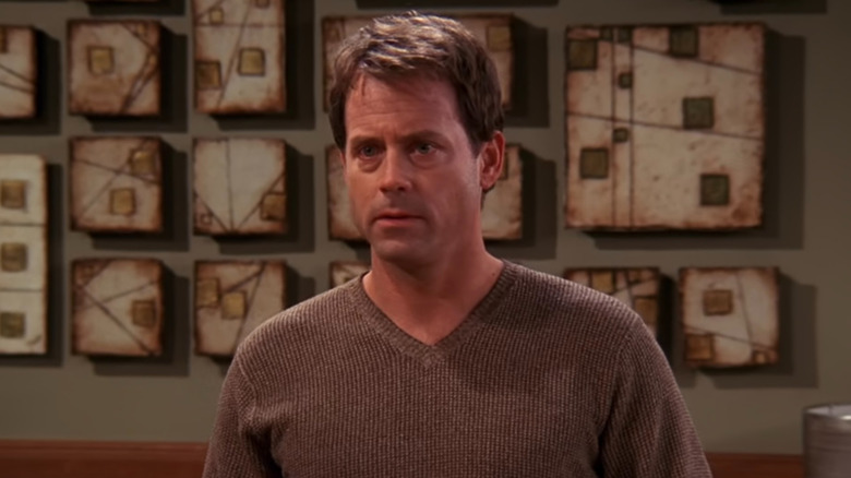 Dr. Benjamin Hobart looking serious