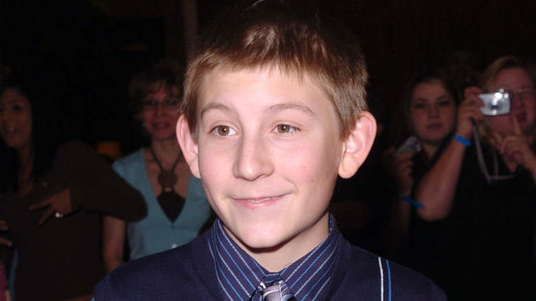 Erik Per Sullivan smiling at an event