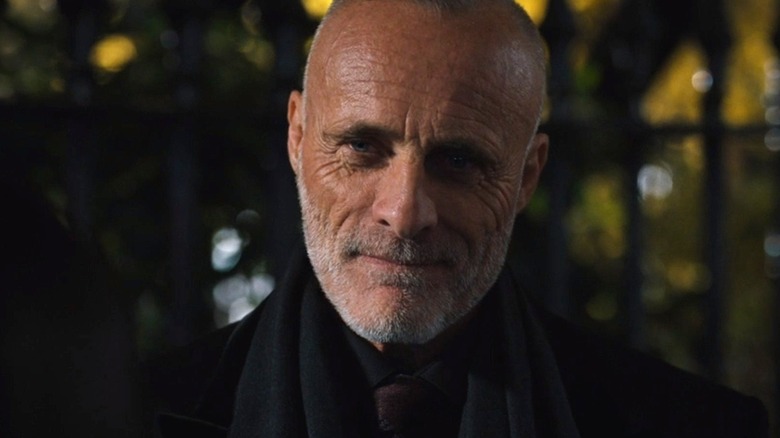 Timothy V. Murphy looking down