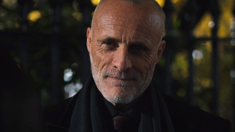 Timothy V. Murphy looking down