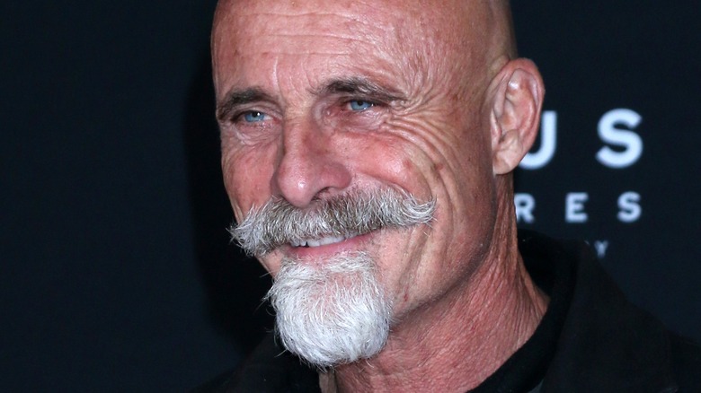 Timothy V. Murphy looking off camera