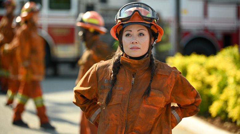 Rebecca Lee in firefighter uniform