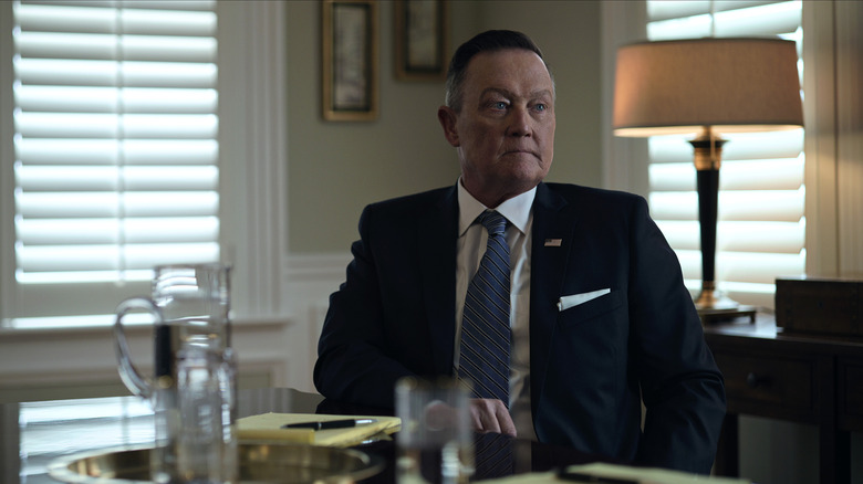 Robert Patrick sitting at a desk