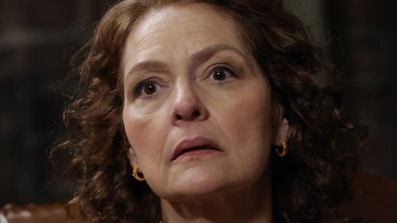Aida Turturro looking concerned as Heddie Hawkins