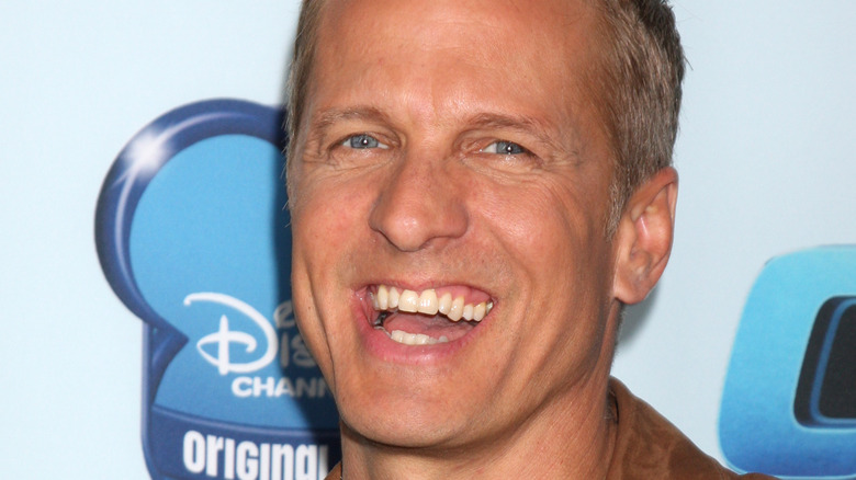 Patrick Fabian smiles at a premiere