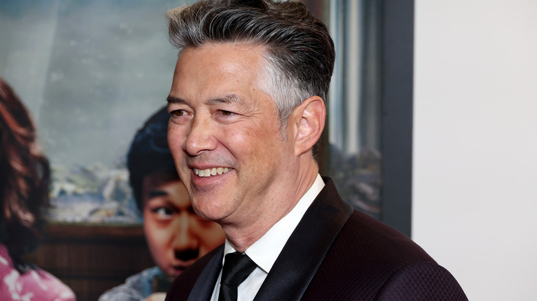 Russell Wong smiling 